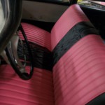 1957 plymouth savoy front bench redo in black and pink. White and pink 2 color pinstripe stitching.