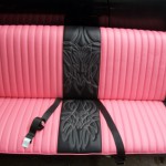 1957 plymouth savoy front bench redo in black and pink. White and pink 2 color pinstripe stitching.