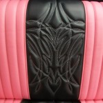 1957 plymouth savoy front bench redo in black and pink. White and pink 2 color pinstripe stitching.