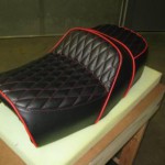 King and queen seat redo in black with red diamond stitching.