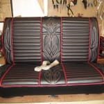 Hot rod seat in black and red. Red and white pinstripe stitching