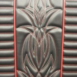 Hot rod seat in black and red. Red and white pinstripe stitching