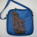 Moi Easter island monlith on a square vinyl-lux bag.