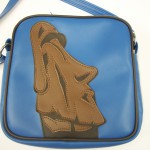 Moi Easter island monlith on a square vinyl-lux bag.